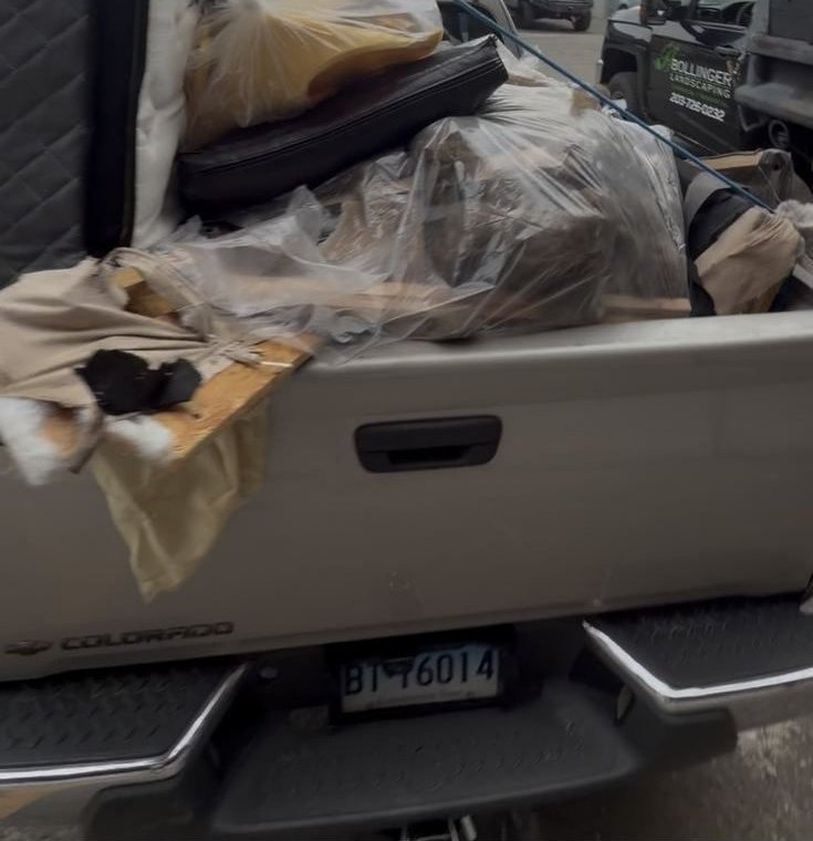 Truck bed loaded with furniture during a Gold Coast Junk Removal job